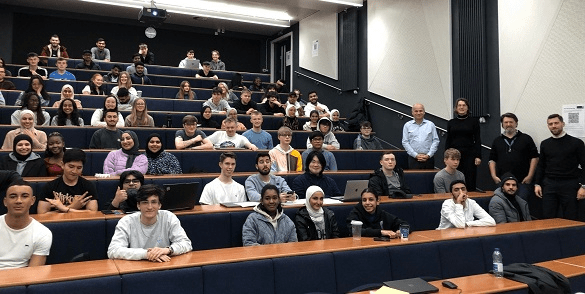 Students sitting in a university lecture theatre